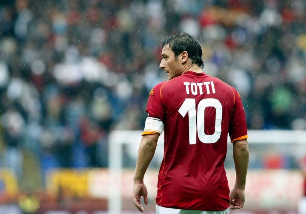 Francesco Totti, the eternal Roman, celebrating a goal for AS Roma