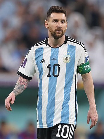 Lionel Messi lifting the 2022 World Cup, cementing his status as the greatest number 10.